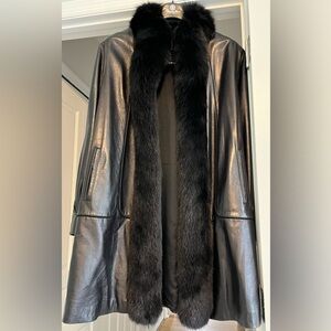 Black leather and fox fur swing coat.